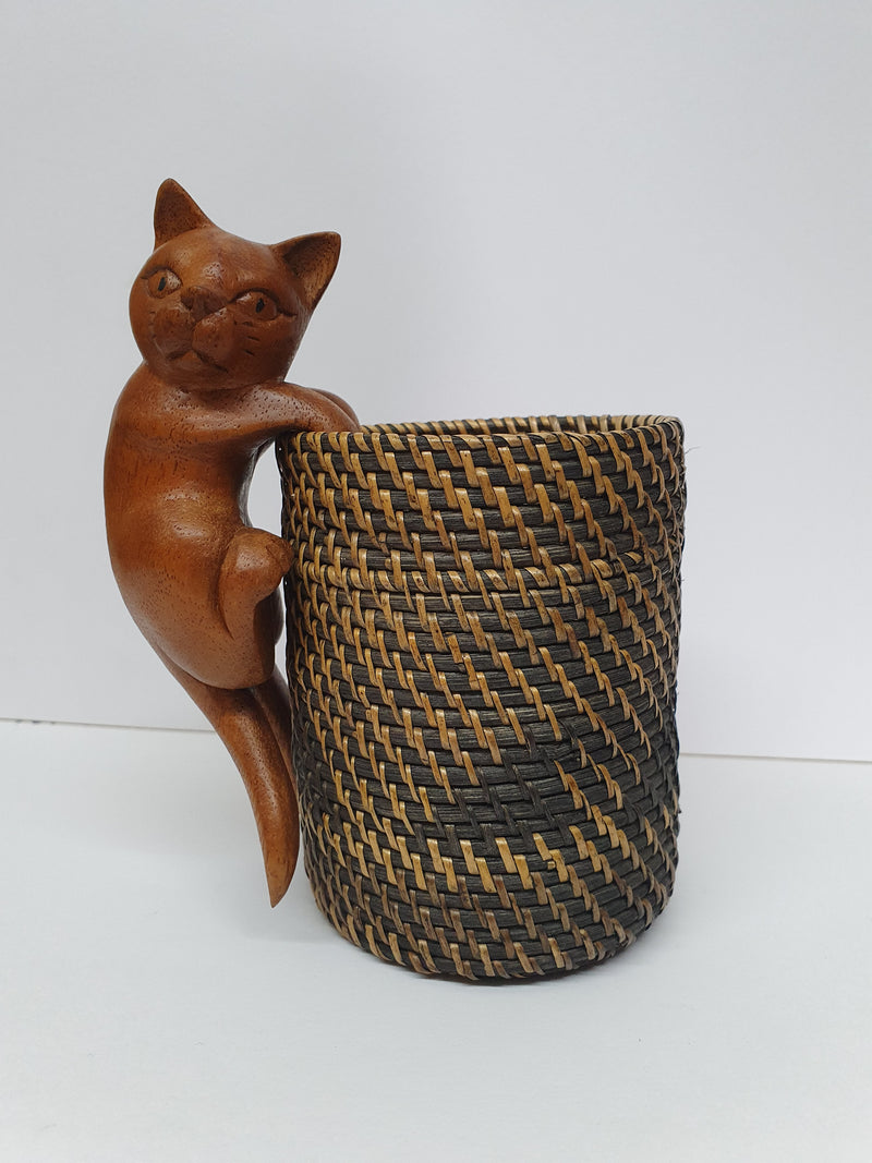 Carved climbing cat