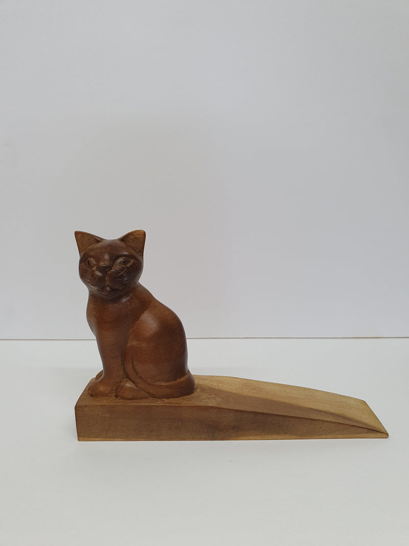 Carved wooden cat doorstop