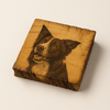 Wooden block with a dog engraving on a beige background