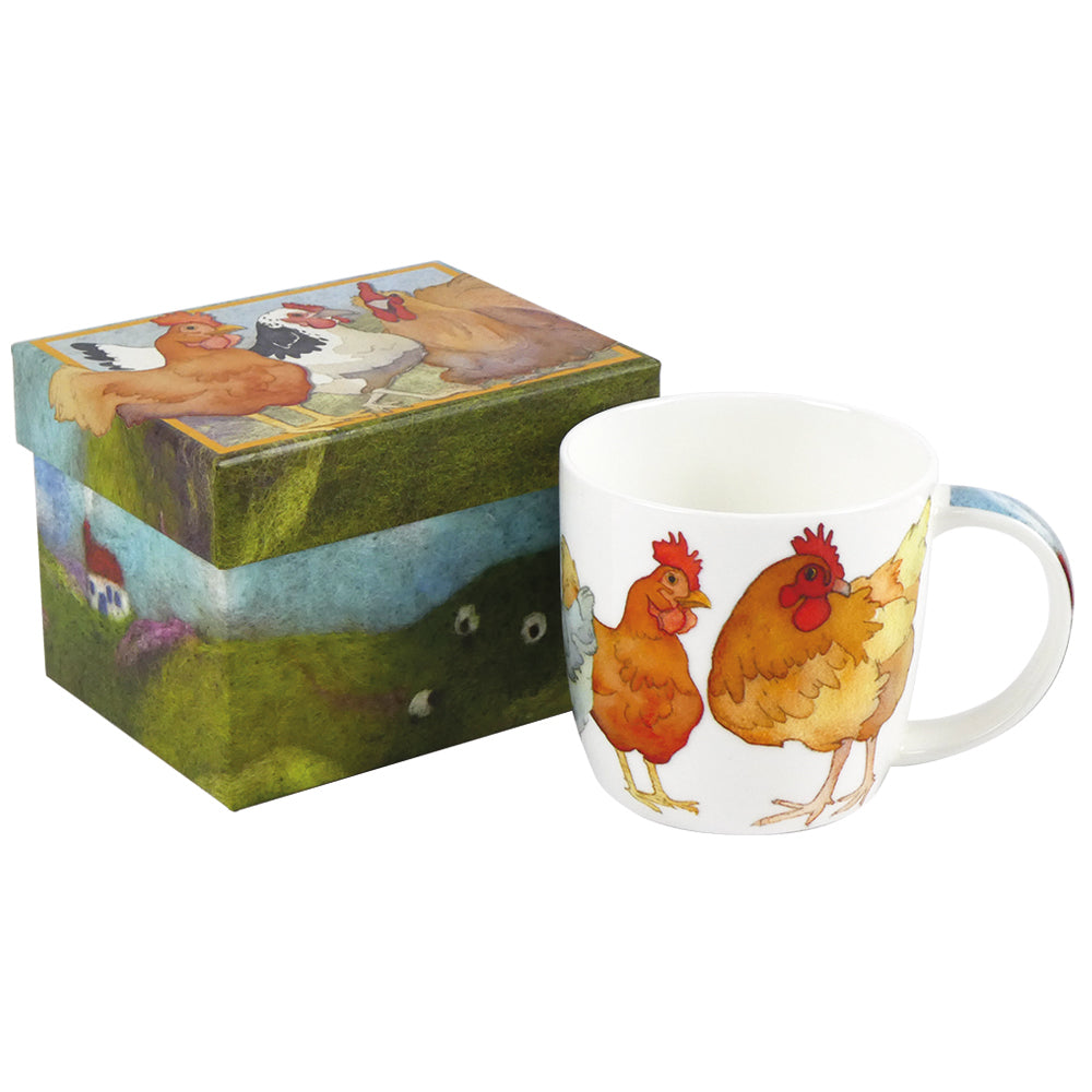 A ceramic mug with an illustration of chickens on it, placed next to a box with a similar chicken-themed design.