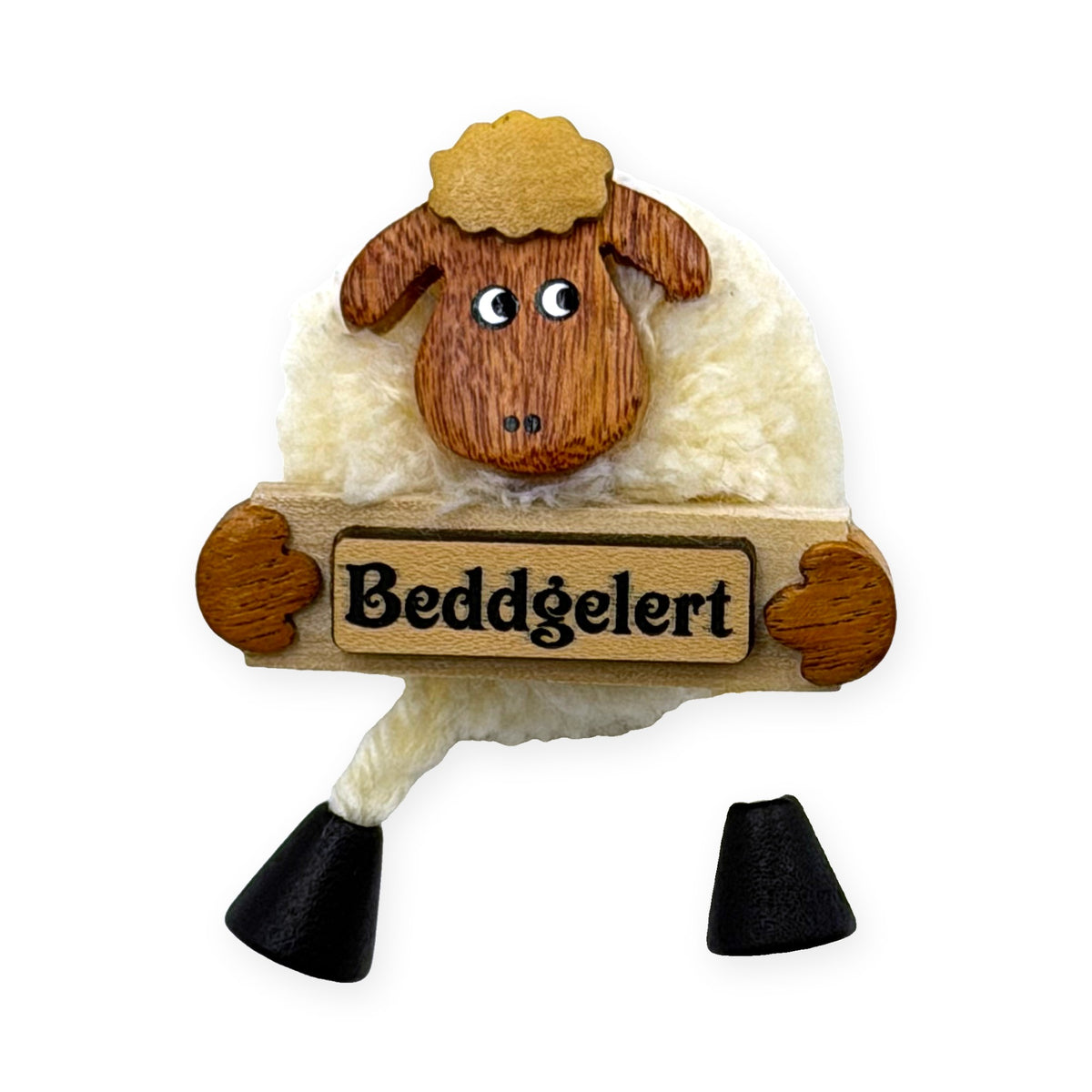 Pom pom sheep fridge magnet holding a Beddgelert plaque