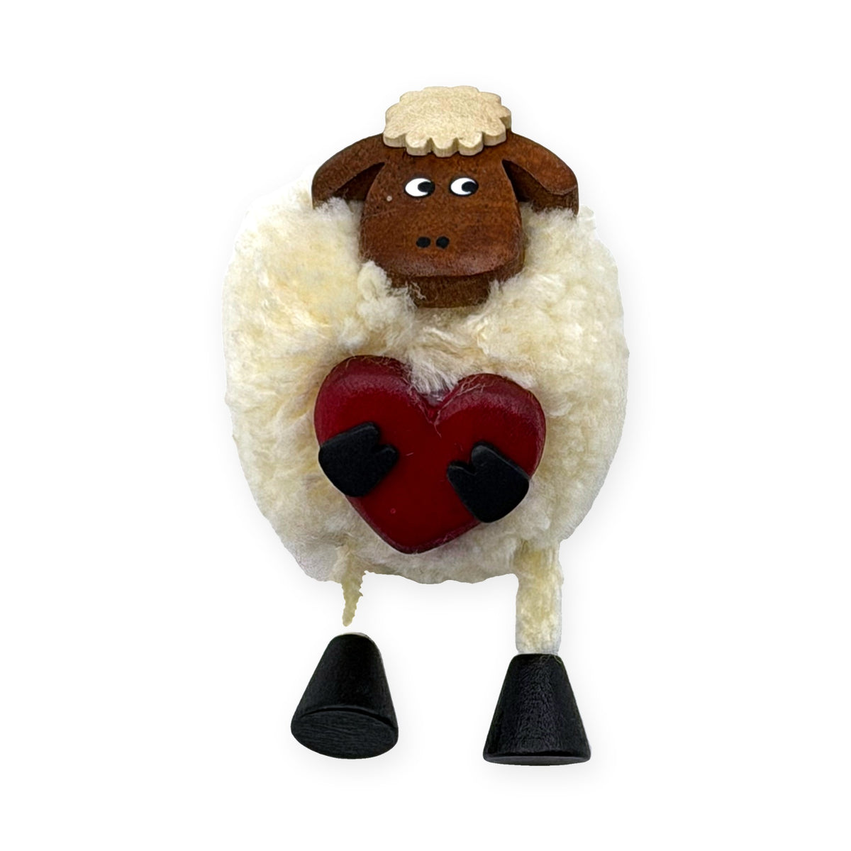 Pom pom sheep fridge magnet holding a red heart