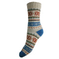 Knitted sock with colorful pattern on a white background